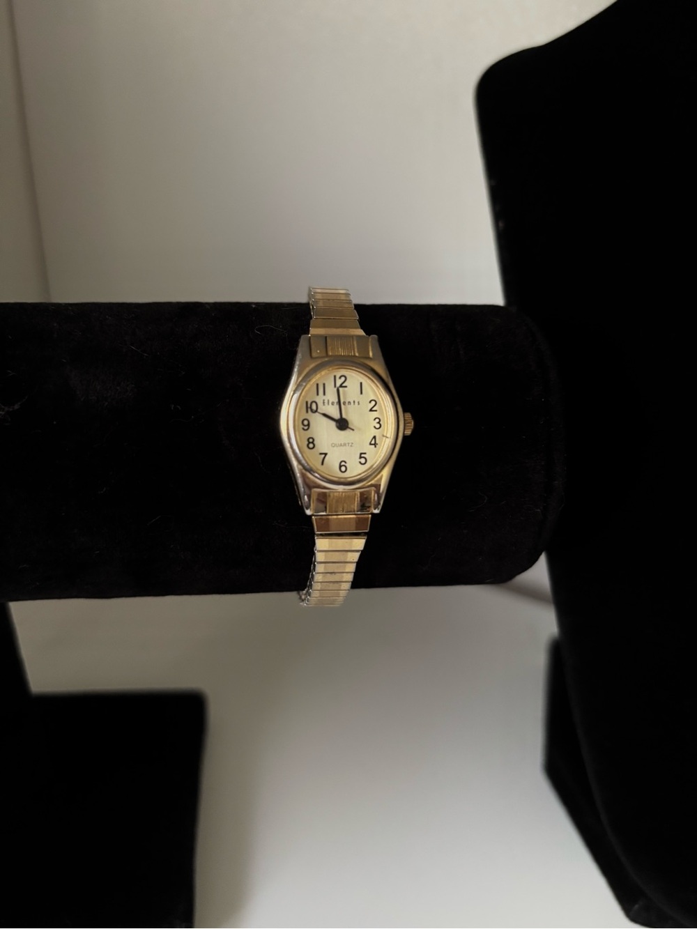 Vintage gold tone women’s elements quartz watch